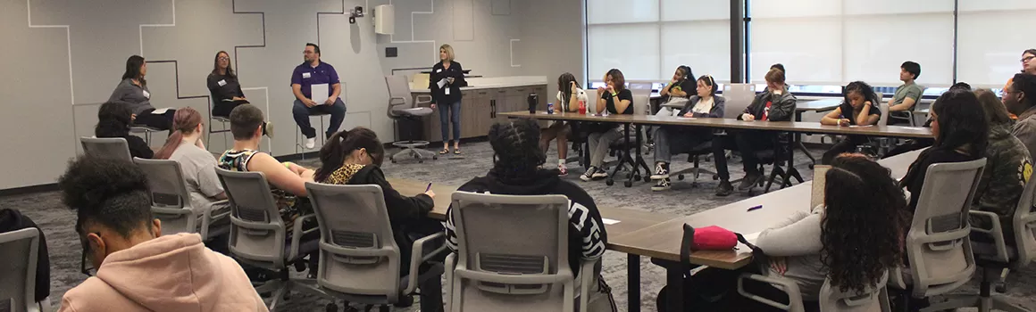 group of North Side HS sophomores listening to Fort Financial career panel