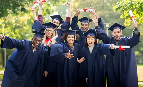 group of college students celebrating graduation